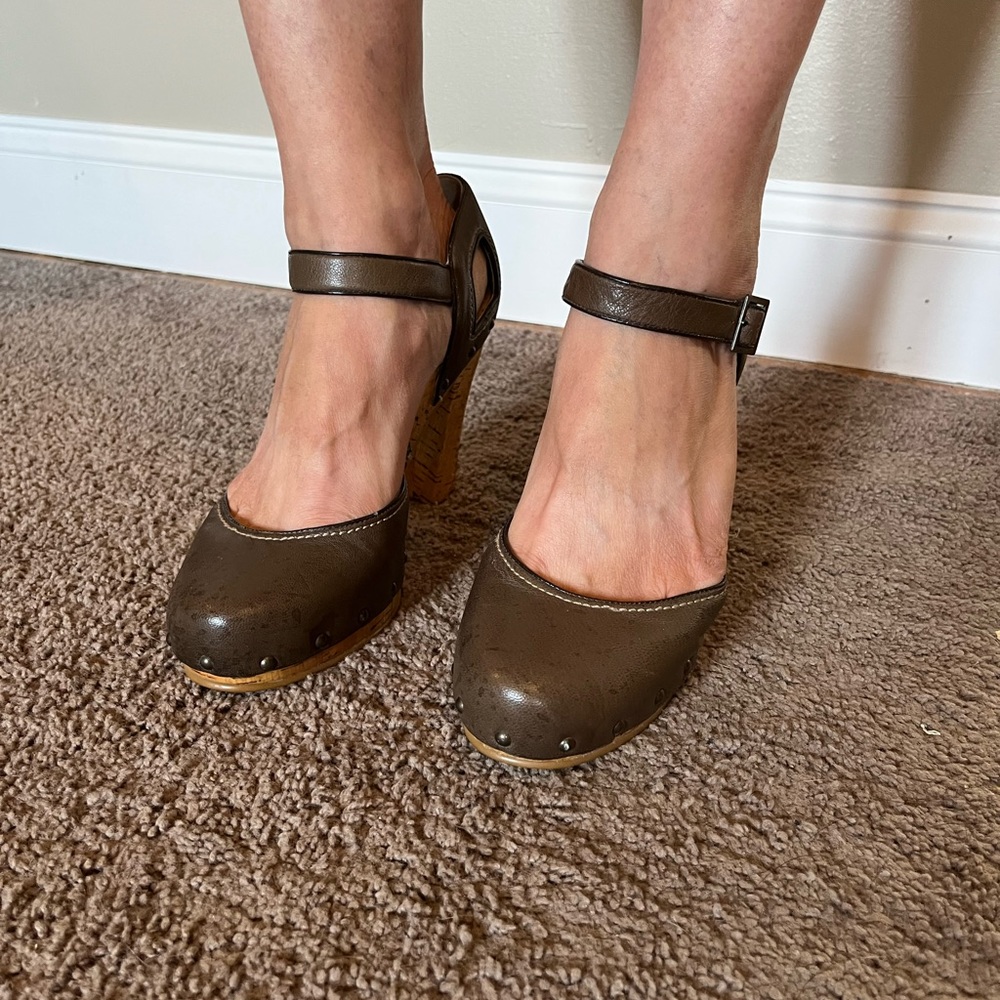 Calvin Klein brown leather wooden heel.